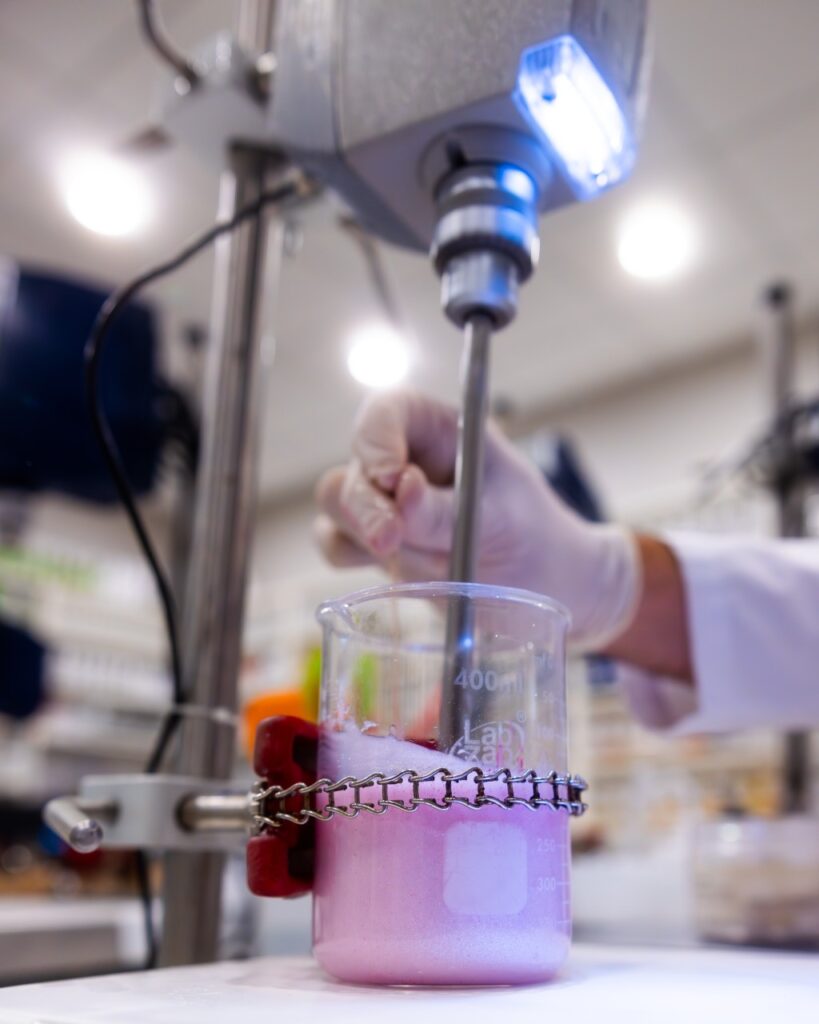 Cosmetic manufacturing lab testing beaker at AMR Labs