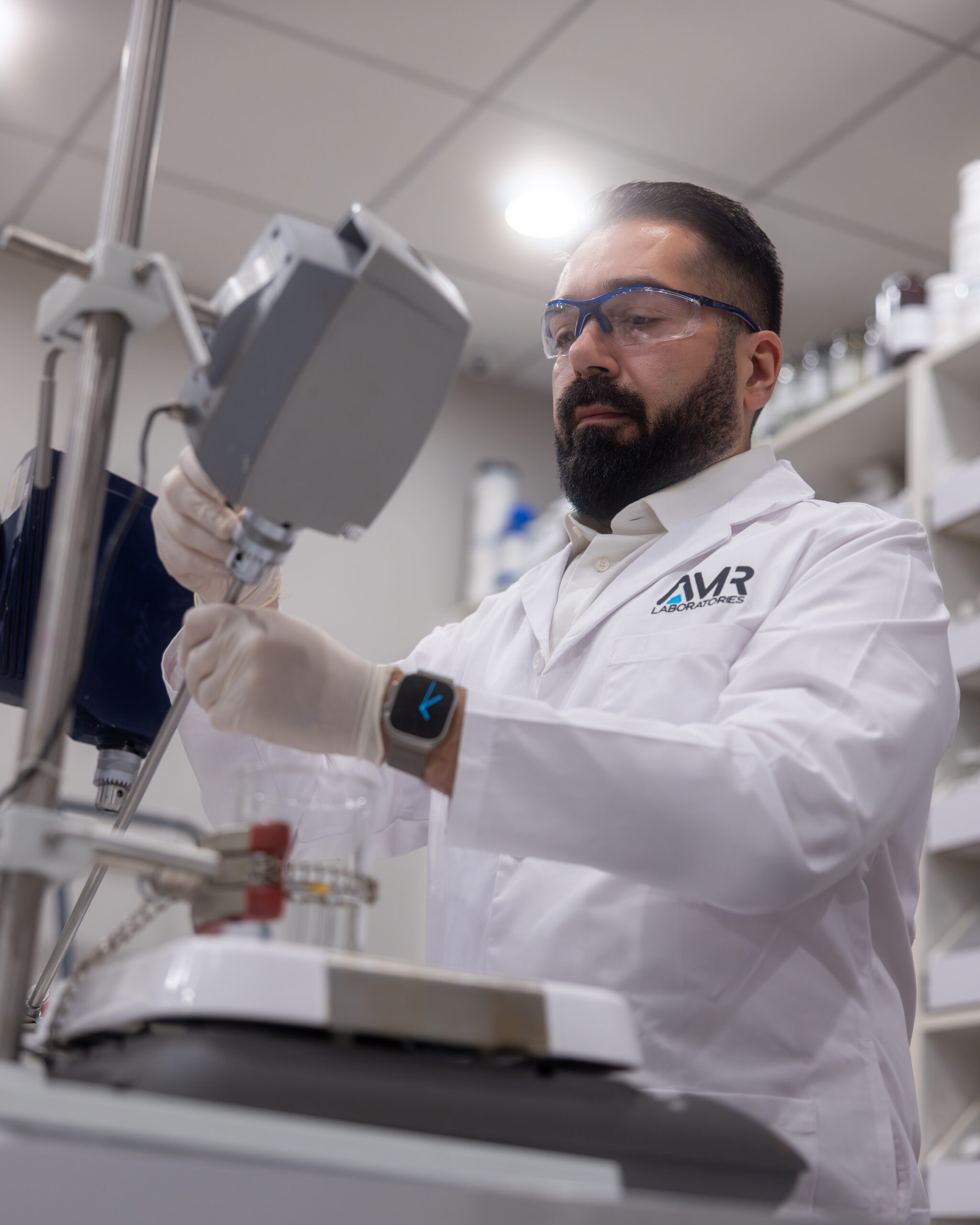 AMR Labs custom formulation R&D AMR Labs chemist working with lab equipment during custom formulation R&D